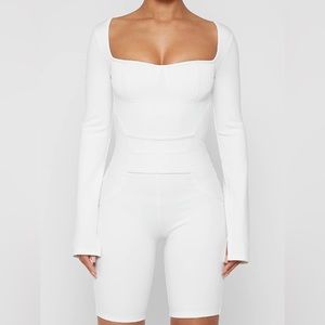 Brand new Stretchy long sleeve white jumpsuit! Sexy and comfortable!